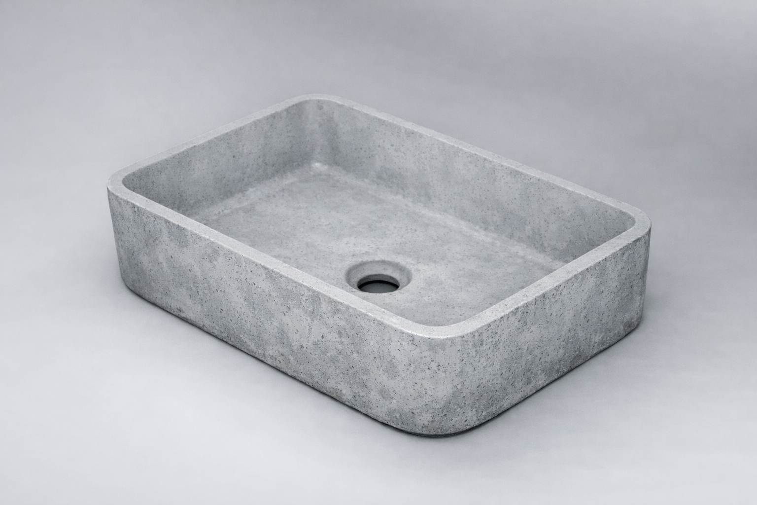 Rectangular concrete basin on a light gray background